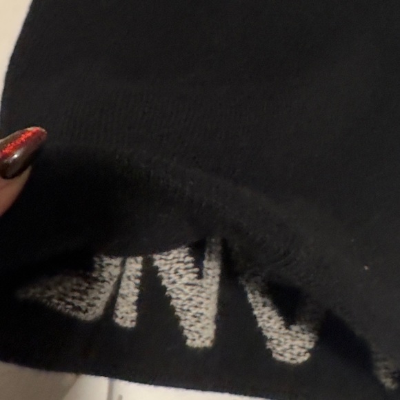 Chanel beanie from dame ski collection as headband seen on Kylie Jenner.